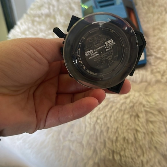 Action Figure on Blue Toy Car - Picture 6 of 6